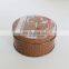 Vintage flat round tin box with embossed logo to metal storage box