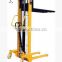 Hand-actuatedl foldable 2 ton lifting stacker