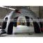 inflatable doom tent with white top and black leg. spider doom tent