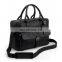 Black messenger bag with handle and front pocket