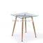 Glass dining table with 4 chairs in wooden transfer finishing