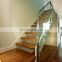 Pressed glass balustrade spotted gum treads elegant modern stairs