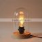 Decorative indoor cloche table light with Edison filament bulbs