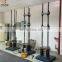 Creep testing machine for testing creep deformation of concrete