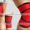 Compression neoprene knee support with adjustable spring support