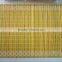 Yellow colored bamboo table mat from Vietnam