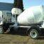 Self loading concrete mixer truck