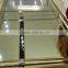 Hot selling golden stainless steel wedding project wedding table with glass top