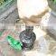 Garden irrigation tool, external thread intake valve plunger