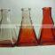 orange colour glass aromatherapy diffuser bottle