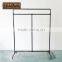 Stand shaped height adjustable floor-pop metal display rack