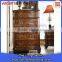 antique wooden chest of drawers, wall cabinet high with carving