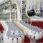 Uplifting Clamping Bottle Conveyor System Line