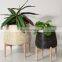 Supplier Plant Stand Seagrass Planter With Wooden Legs Storage Basket Plant Holder Storage Basket Wholesale