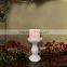 white electric candle with holder