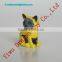 Colorful plastic toy cat figurine
