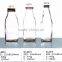 Haonai vintage embossed glass pudding bottle milk bottle with wide mouth cap wholesale
