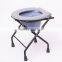 Elderly pregnant woman folding bath chair with commode