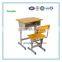 Adjustable school desk and chair for student studying in classroom
