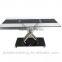 picture of black textural painted metal modern glass and stainless steel dining table design