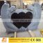 Black granite heart shaped tombstone