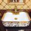 Hot sale ceramic round modern luxury golden single hole wash basin price bathroom basin with gold decorative