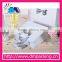 high end nice looking white paper with silver logo