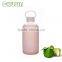 portable glass drink bottle with BPA free silicone sleeve and handle and straw