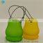 Hanging candle containers with scented candles