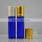 Wholesale gold aluminium cap 10ml blue glass empty perfume roll on bottle