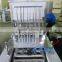Plastic water cup filling and sealing machine/ Automatic stainless steel cup water filling machine
