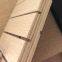 Multilayer solid wood sound-absorbing board