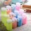 Modern high-grade high quality glass water bottle with silicone sleeve