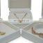 Wholesale white color leather convex edge jewelry box long chain box