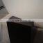 rectangular freestanding cast iron bathtub with wooden cradle