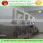 High capacity industrial tunnel microwave drying for green leaves