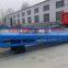 Logistic equipment container unloading system