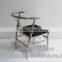vintage industrial tubular metal frame chair with modern leather seat