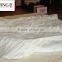 white quilt bed cover