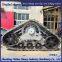 Retrofitting a harvester with triangular track wheels to prevent sinking in mud