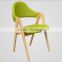 green color fabric indoor wood chair