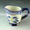 China factory unique shaped ceramic cup with handle, cheap stock porcelain cup for wholesale