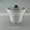 Stocked ceramic tureen with glass lid and iron stand