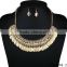 Gorgeous oval gold disc chain with crystal necklace with matching earrings