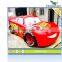 Various Cartoon Cars With Horns Driving By Kids