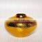 round small gold plated flower pot