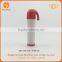 red-and-white Santa Claus cap lip balm container
