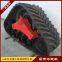 Retrofitting of large harvesters with anti sinking track chassis and anti slip measures