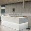 solid surface white beauty salon front counter reception desk