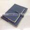 Notebook with button for closure